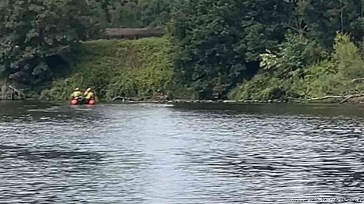Man pulled from water as emergency services descend on Manchester Ship Canal