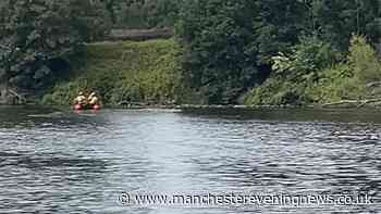 Man pulled from water as emergency services descend on Manchester Ship Canal