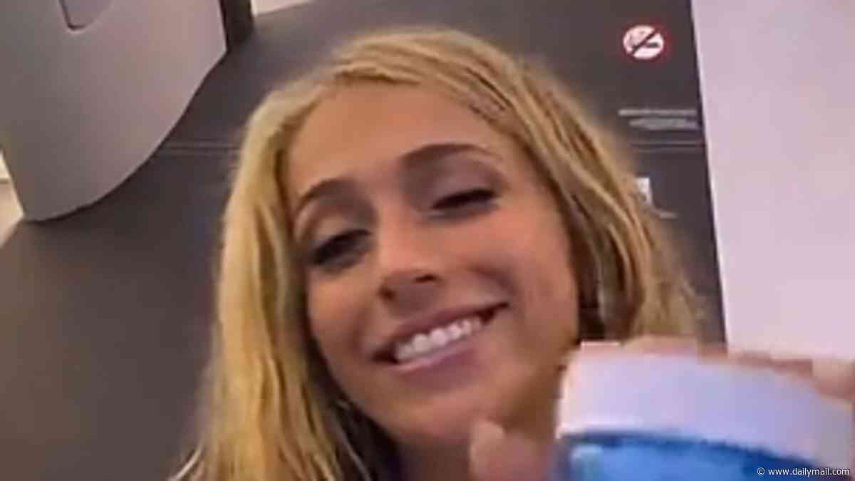 Tate McRae is mocked by fans for 'pretending' to apply budget skincare in promotional post as they spot the 'lid is still on the moisturiser' and she 'still has a full smokey eye'