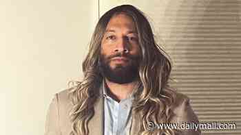 Ex-NBA player who says he is now a woman and has declared for the WNBA Draft poses in a wig: 'My feminine era'