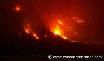 Wildfires burn across western U.S. and Canada as residents are evacuated