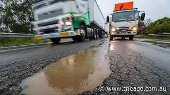 Drivers stranded on Princes Highway as potholes wreak carnage in wild weather across Victoria