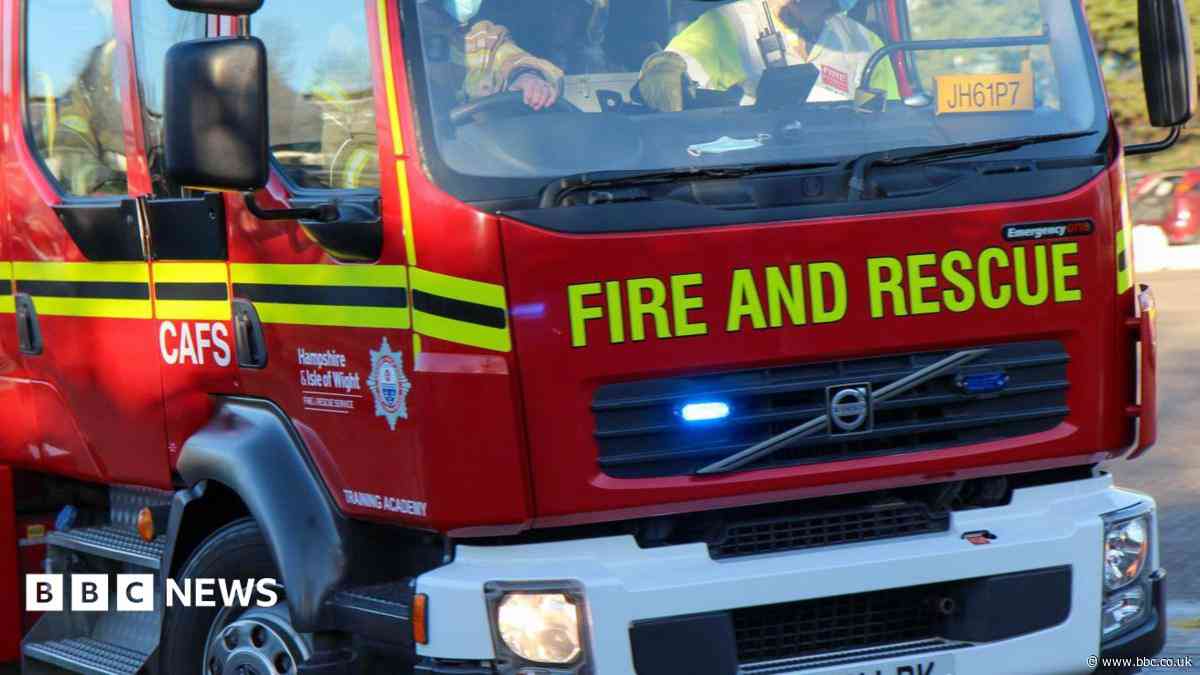 Seventy firefighters tackle blaze at sports club