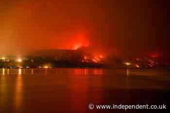 Thousands evacuated as wildfires burn across western US and Canada