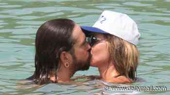 Bikini-clad Heidi Klum, 53, packs on the PDA with husband Tom Kaulitz, 36, in St Barts after revealing she's embracing a 'fuller figure' as a result of the menopause