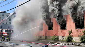 Mass. firefighters battle 6-alarm fire in abandoned commercial structure