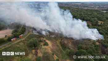 Crews remain at scene of country park fire