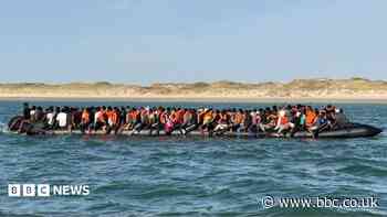 Record 230 people cross Channel in one small boat