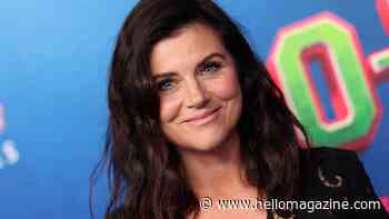 '90s star Tiffani Thiessen, 52, sizzles in olive green bathing suit during family's lakeside vacation