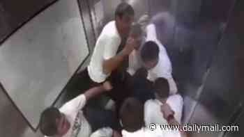 Packed elevator plunges 50ft, with four men suffering broken legs