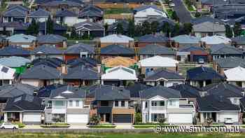RBA keeps rates on hold as major bank warns of 15% property price slump