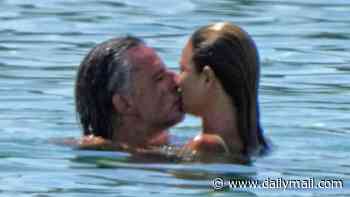 Bikini-clad Dina Broadhurst confirms new romance with German artist Niclas Castello as they kiss at the beach in Ibiza