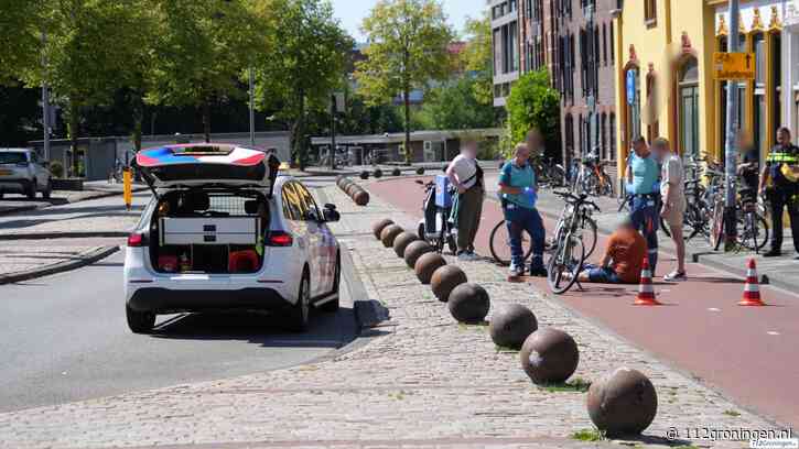 Scooterrijder gewond bij botsing met fietser op Aweg in Groningen