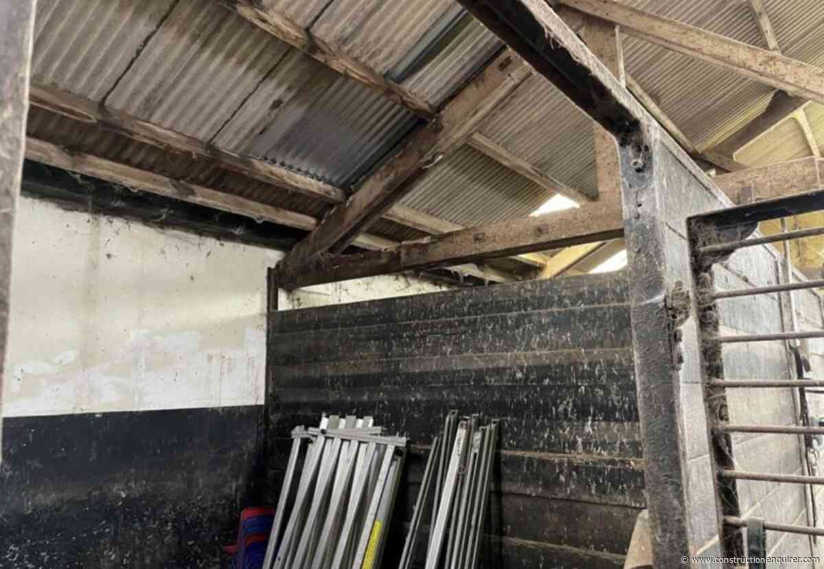 Bricklayer breaks back after falling through roof