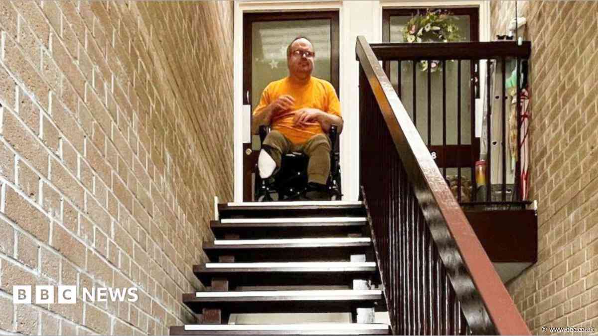 Double amputee 'prisoner' in flat without lift
