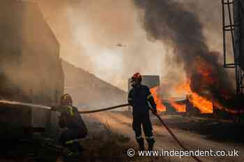 Greece ravaged by wildfires as hundreds of firefighters battle blaze near Athens