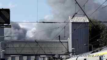 M25 shut both ways over 'explosion risk' as 15 fire engines battle huge fire