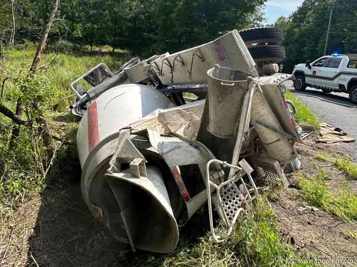 Driver and puppy rescued after cement truck overturns in South Frontenac