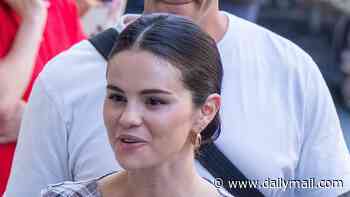 Selena Gomez carries a hot water bottle and wears fluffy slippers as she shoots Only Murders In The Building in London amid rare 'extreme heat' warning