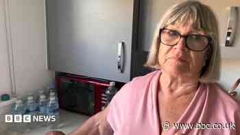 Woman buys back-up bottles due to water 'trickle'