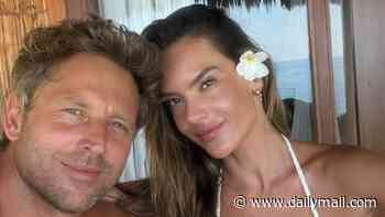 Alessandra Ambrosio is engaged: Supermodel to wed hunky jewelry designer Buck Palmer after bikini-clad proposal