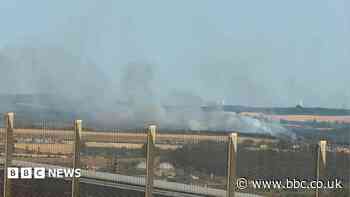 Smoke warning as crews tackle two wildfires
