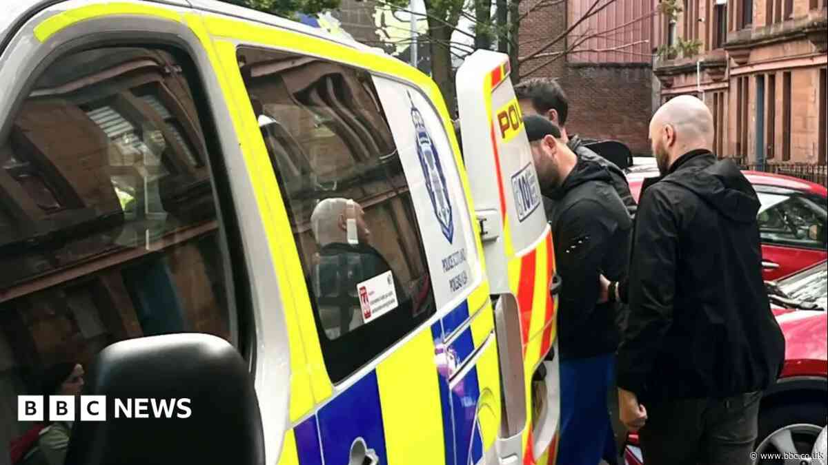 Man, 29, charged after police raid over racist traffic-cone attack