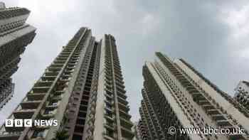 These seaside apartments were a ghost city - then police say scammers moved in