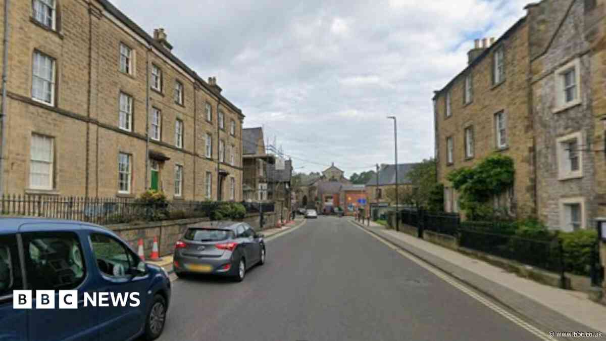Woman in hospital after car strikes railings