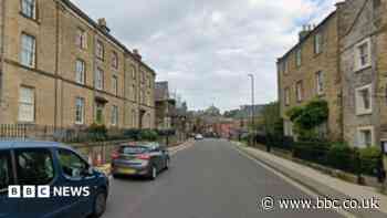 Woman in hospital after car strikes railings