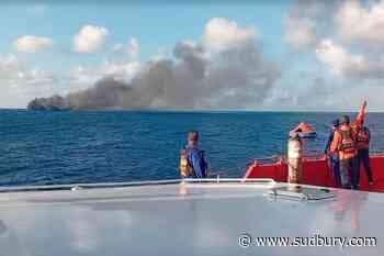Crews work to rescue more passengers from burning ferry near Bali, Indonesia