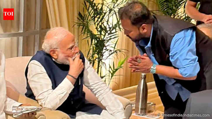 Who was the man PM Narendra Modi listened to so intently at Revati Sule’s reception?