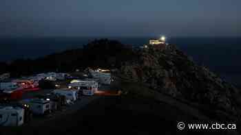 Spain dealing with influx of solar eclipse tourists while still battling wildfires