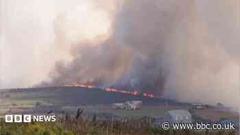 Crews tackling wildfire near Land's End Airport