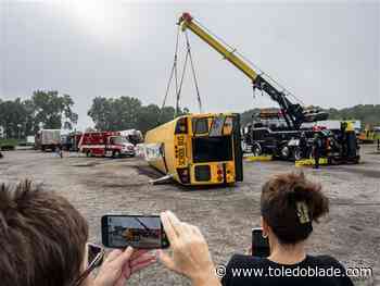 Bus drivers observe rollover crash during safety demonstration