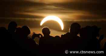 Total solar eclipse darkens skies across Northern Hemisphere