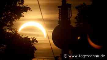 Millionen verfolgen Sonnenfinsternis über Deutschland