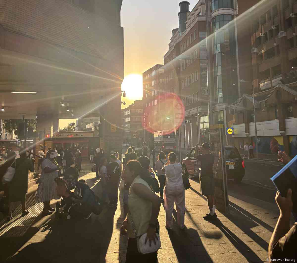 Crowds gather in Harrow Town Centre to watch rare solar eclipse