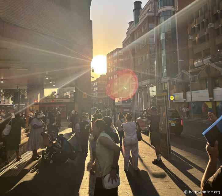 Crowds gather in Harrow Town Centre to watch rare solar eclipse
