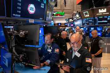 Wall Street edges near its record as AI stocks rise and worries about inflation ease a bit