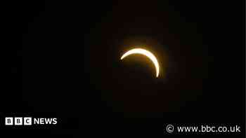 In pictures: Sky watchers gather for solar eclipse