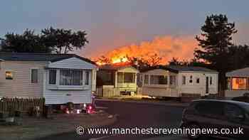 Fire crews tackling 'significant' blaze burning 'for hours' in Formby sand dunes