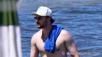 Struggling MLB star Paul Skenes hits the beach with 'dad bod' alongside girlfriend Livvy Dunne... before latest concerning performance