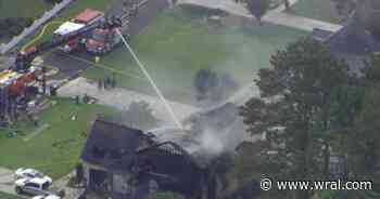 Crews fight large house fire in Harnett County