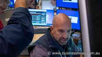 Wall Street ends mixed as optimism on AI shares returns