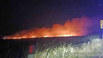 Saddleworth Moor fire LIVE: Emergency crews battle huge moorland blaze as road closed