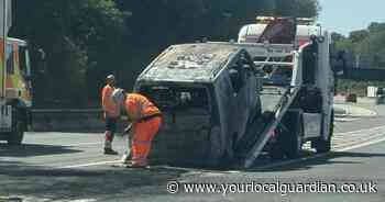 One suffers burns as van goes up in flames near M25, sparking motorway gridlock