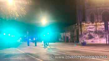Man seen 'smashing objects' on the roof of building in Warwick