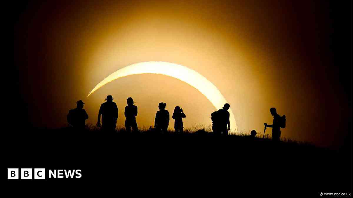 Photos show rare partial solar eclipse