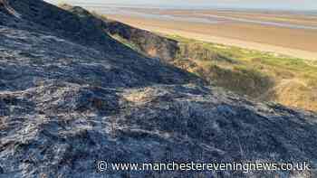 Avoid the area warning issued over beach popular with Mancs